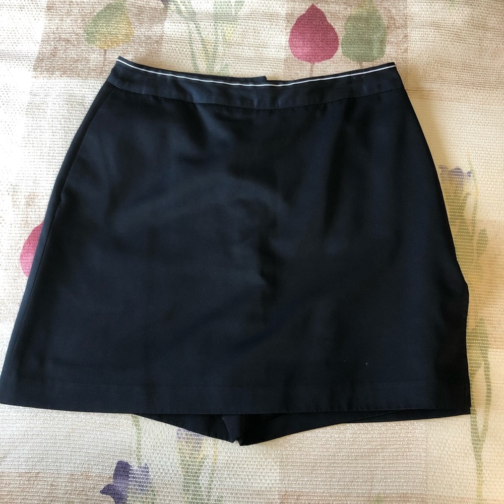 EP Pro Skort black with white line detail on waistband. Like new.